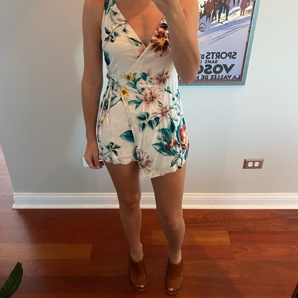 Floral white romper with a great side tie detail